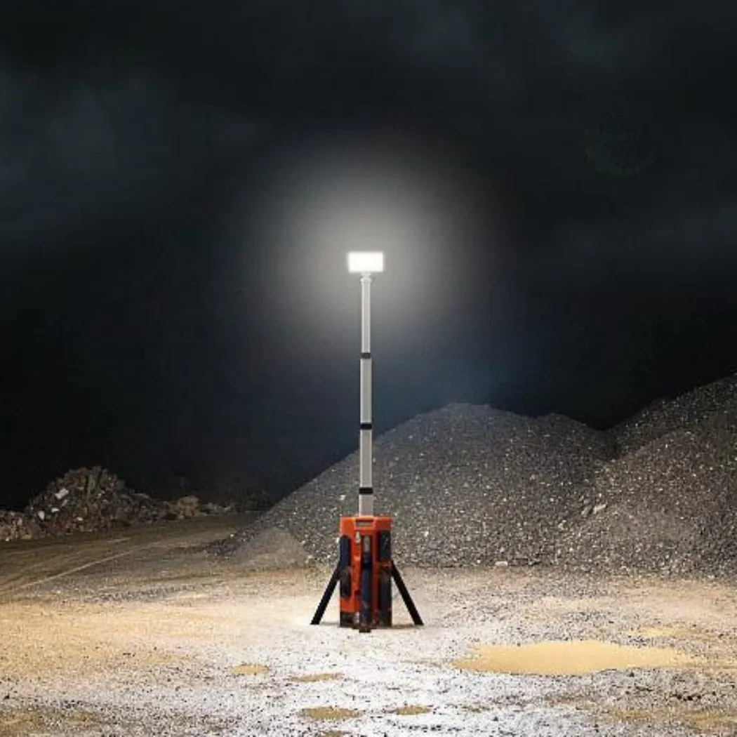 HRZ322 battery tower light illuminating a worksite at night