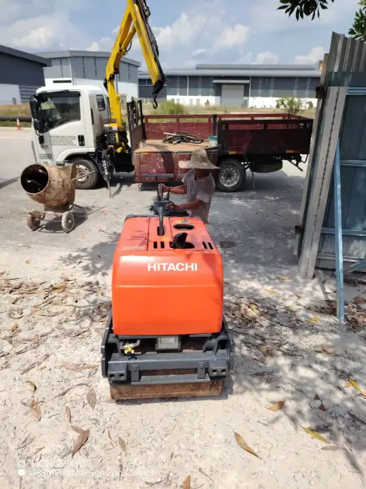 Hitachi orange roller delivered to customer site at Puncak Alam 1