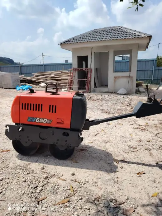 Hitachi orange roller delivered to customer site at Puncak Alam 3